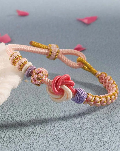 Bracelet with knot of peach blossoms