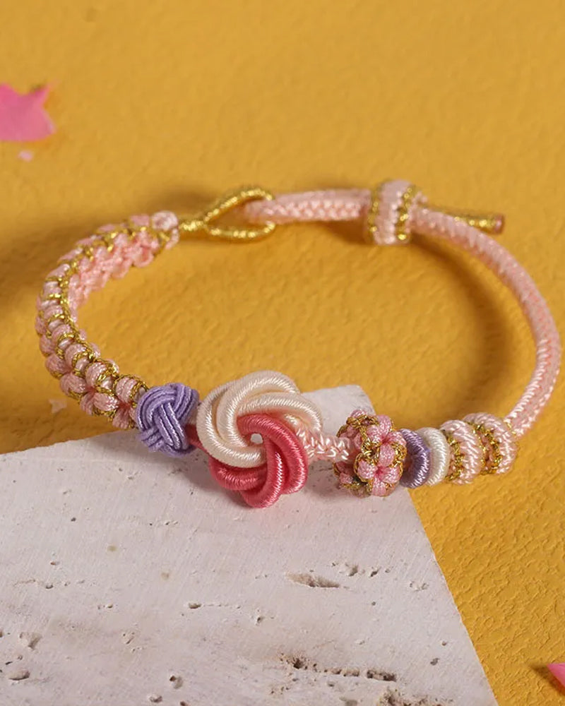 Bracelet with knot of peach blossoms