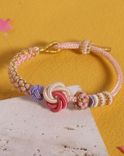 Bracelet with knot of peach blossoms