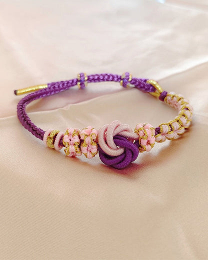 Bracelet with knot of peach blossoms