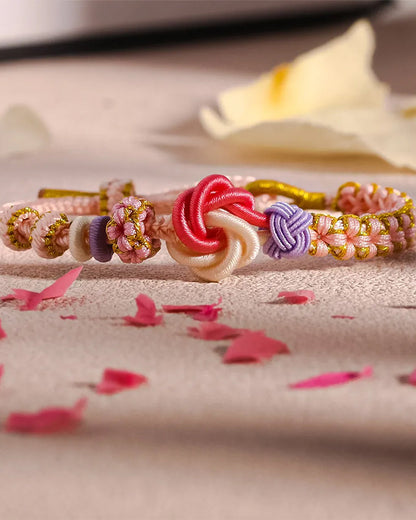 Bracelet with knot of peach blossoms