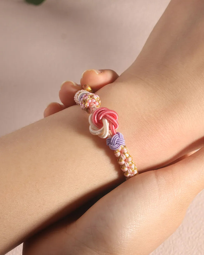Bracelet with knot of peach blossoms
