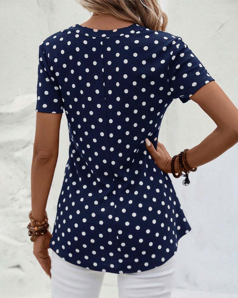 Polka dot zippered blouse